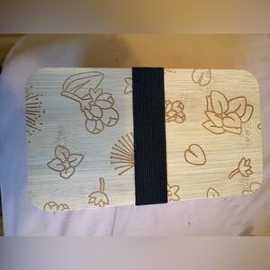 Stacked Lunch Box with Hawaiian flower design and comes with Black Strap